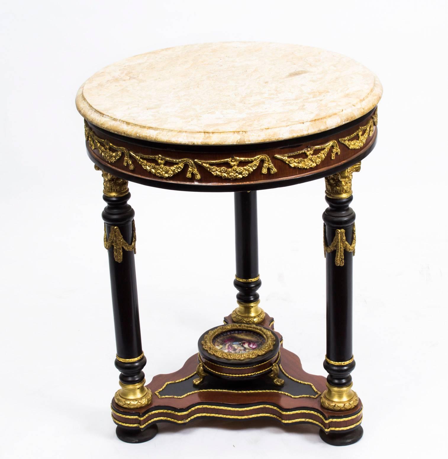 A stunning and unusual pair of French Louis Revival occasional tables.

These gorgeous pieces were inspired by the Louis XV style and date from the second half of the 20th Century.

Elaborately detailed, they feature ebonised legs, exquisite