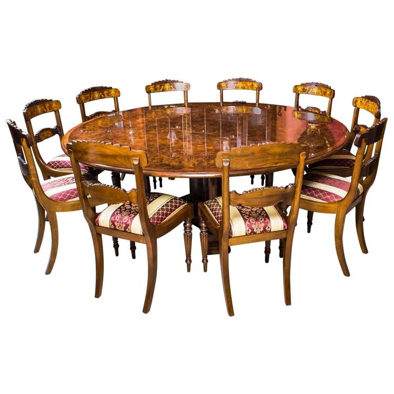 Burr Walnut Jupe Dining Table and Ten Chairs at 1stdibs