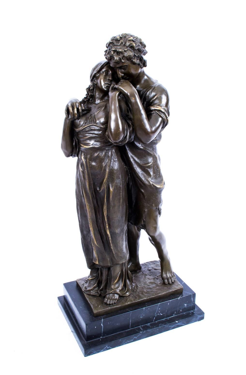 A stunning and extremely lifelike bronze depicting two lovers in classical garb, from the last quarter of the 20th century.

The piece is set on an attractive marble base.

Bearing the replica signature of 'Milo.'

This high quality bronze is