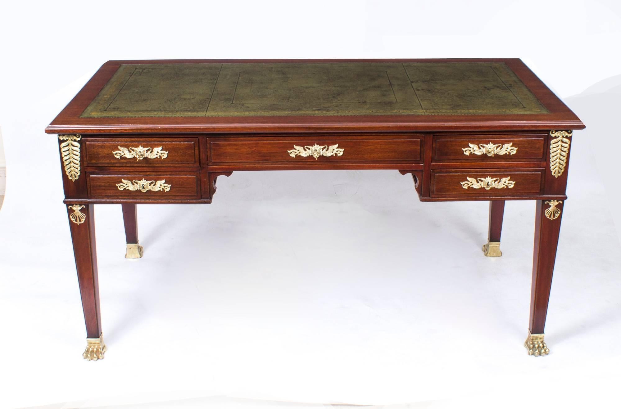 We are very pleased to be able to offer this Antique French Empire Ormolu Mounted Desk and Chair for sale. 
Dating from around 1880, this French Empire Desk and Chair is fashioned in flame mahogany with ormolu mounts.
With elegant proportions the