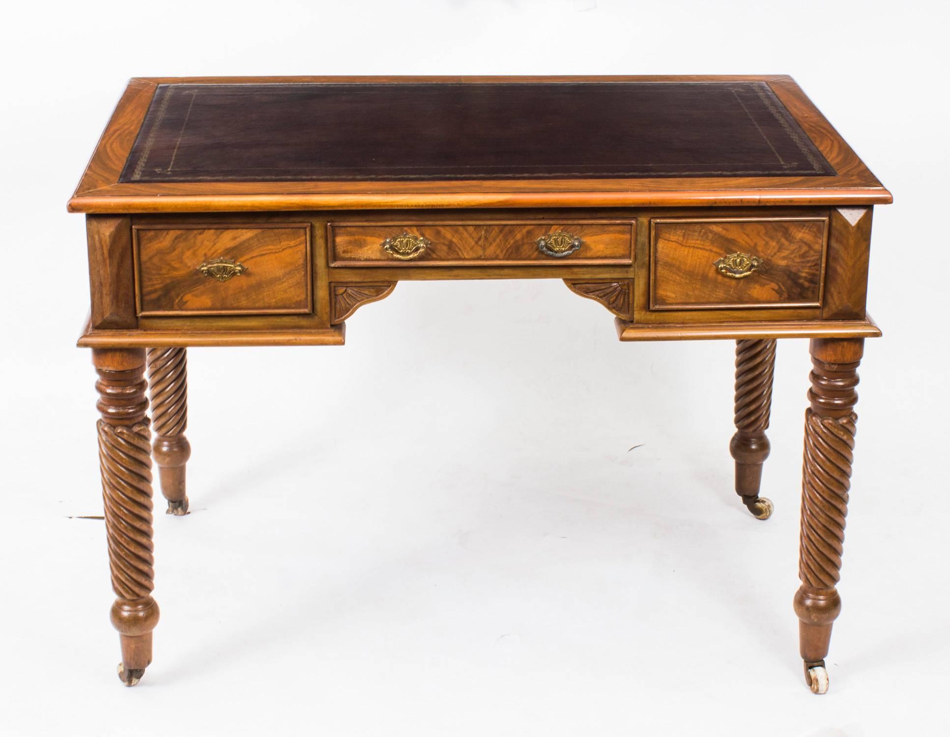 This is a very nice example of an antique writing table which has been superbly made from top quality figured walnut. It has been made, in the Victorian manner, and we have dated it to around 1900 which was almost at the end of Queen Victoria’s