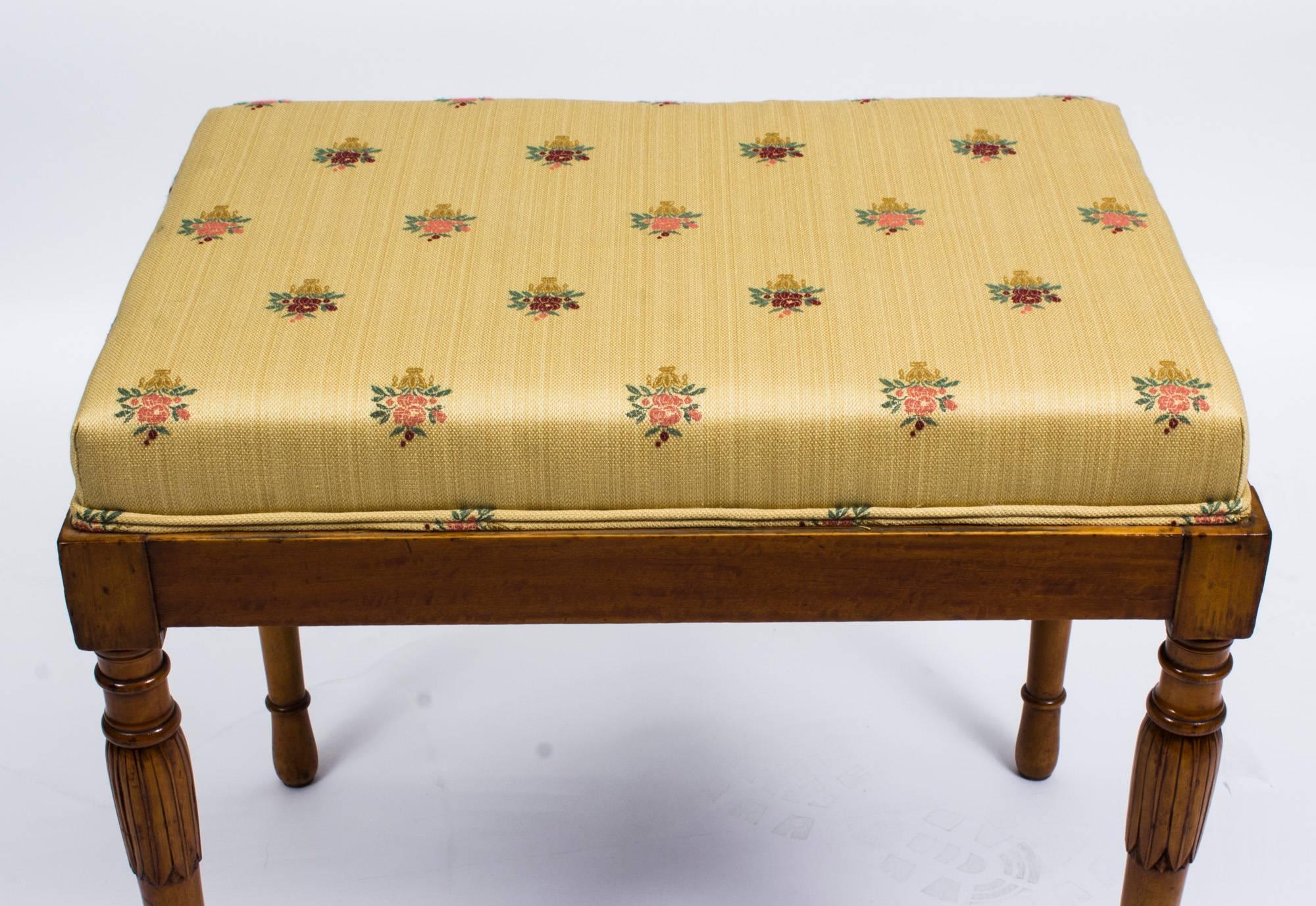 This is a superb antique English Edwardian satinwood stool, circa 1900 in date.

The stool has been upholstered in a lovely sandy linen with occasional flower bunches. 

There is no mistaking its high quality and unique design, which is certain
