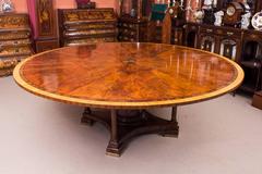 Theodore Alexander Flame Mahogany Jupe Dining Table and Ten Chairs