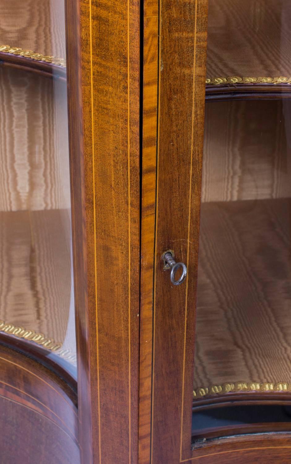 Glass Early 20th Century Edwardian Serpentine Glazed Inlaid Mahogany Display Cabinet