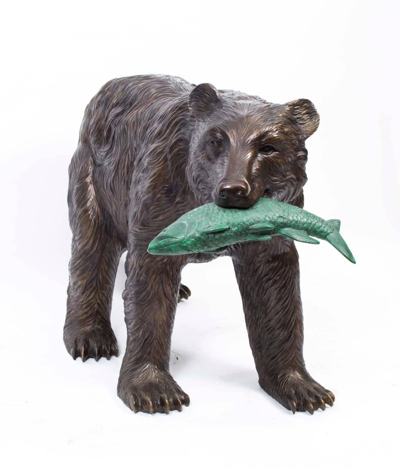 This is an interesting pair of bronze sculptures of wild grizzly bears with golden patinated fur fishing for salmon with their paws.

They date from the last quarter of the 20th century.

They are extremely lifelike and the craftsmanship and