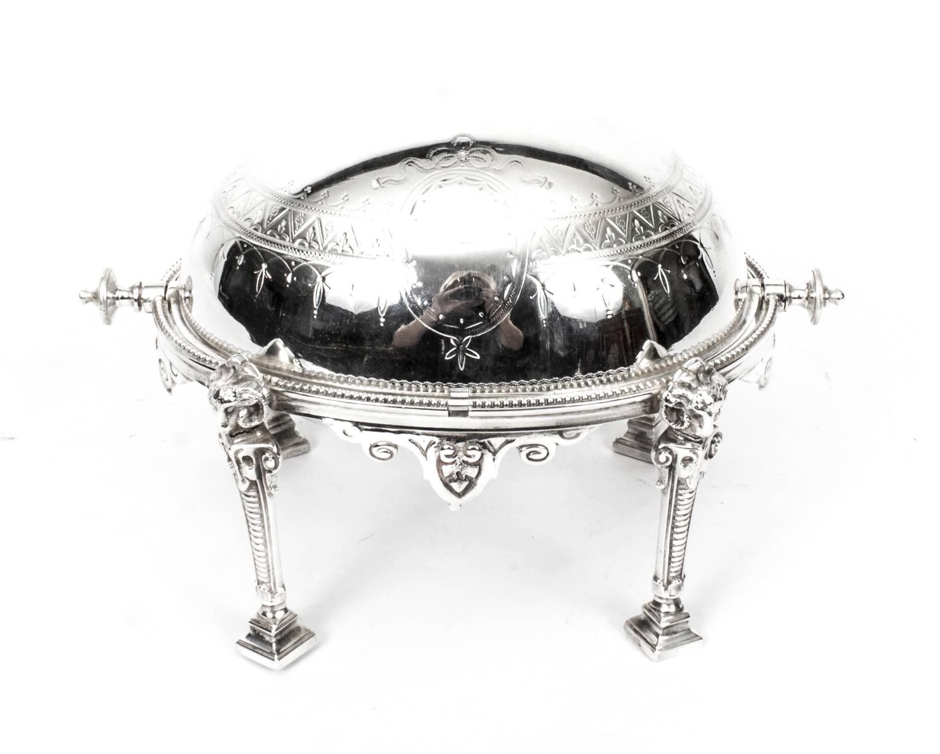 This is a gorgeous antique English Victorian silver plated roll over butter dish, circa 1870 in date.

With superb engraved and cast decoration and bearing the makers mark HA EA FA for the renowned silvermith Atkins Brothers Sheffield,