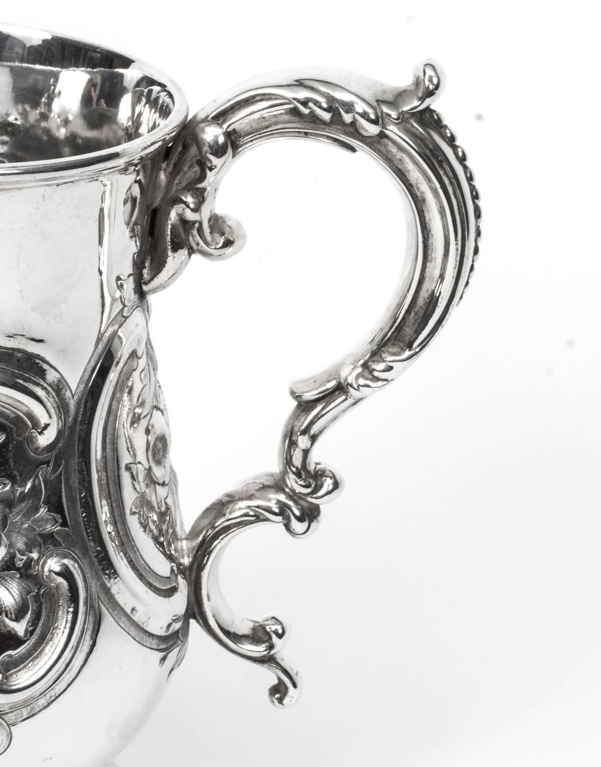 This is a superb antique Victorian English silver Tankard, circa 1870 in date bearing the cross keys makers mark for H. Wilkinson & Co, Norfolk Street, Sheffield.


Condition:
In excellent condition, please see photos for