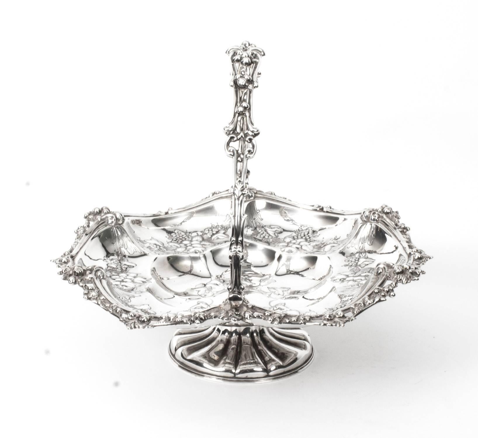 This is a stunning antique English Victorian silver plated fruit or bread basket with fabulous embossed and engraved decoration, circa 1880 in date.

It bears the makers mark of the London silversmiths John Wilmin Figg.

Add a beautiful touch to