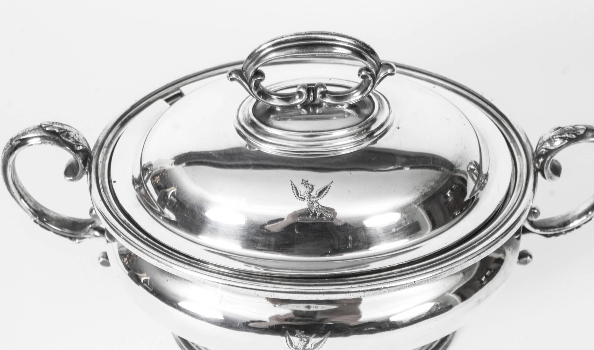 This is an exquisite and rare antique pair of English silver plate sauce tureens and covers with liners and twin handles, circa 1860 in date.

They are of the highest quality, in excellent condition and are ready to grace your dining table, the