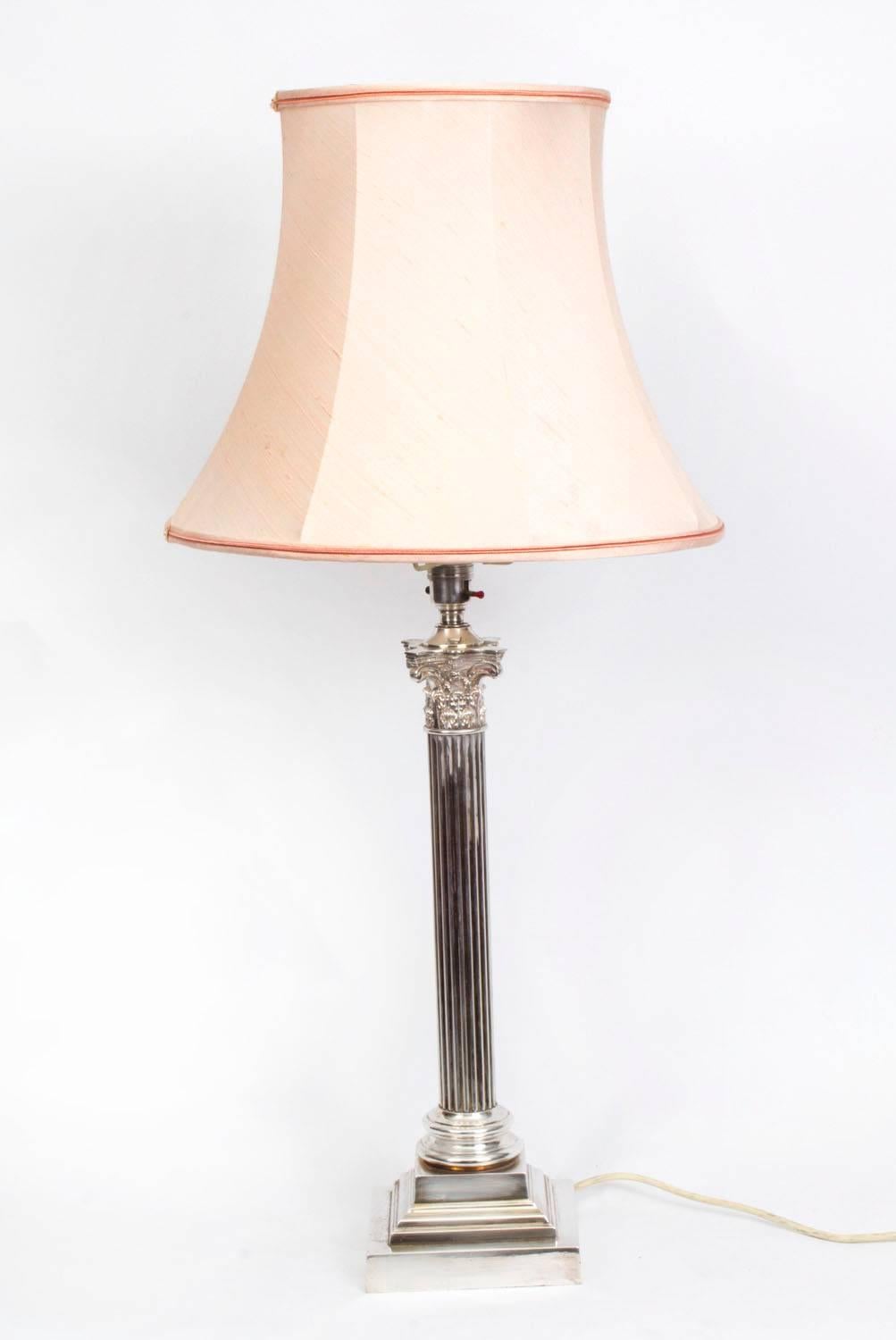 This is an elegant antique Victorian silver plated Corinthian column table lamp with shade, in Elkington style, circa 1880 in date.

In working condition having been rewired.


Condition:
In excellent condition having been beautifully restored