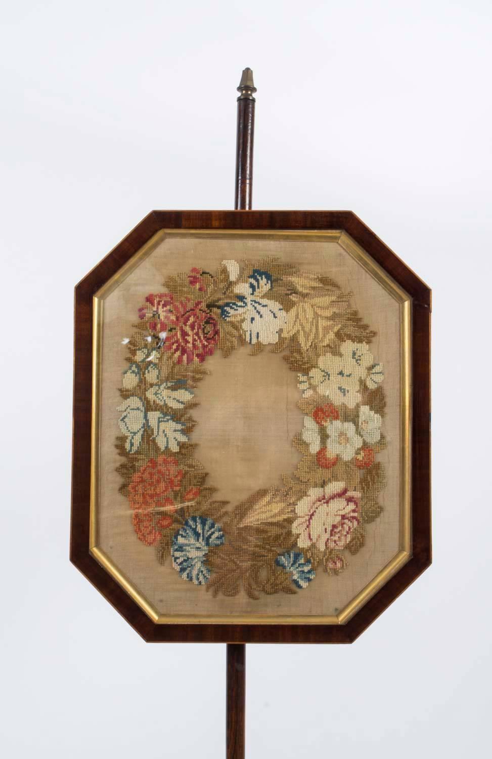 This is an attractive antique English William IV rosewood pole screen, circa 1835.

It features a beautiful floral tapestry panel.

As such, this screen is sure to take pride of place in your home


Condition:
In excellent condition -
