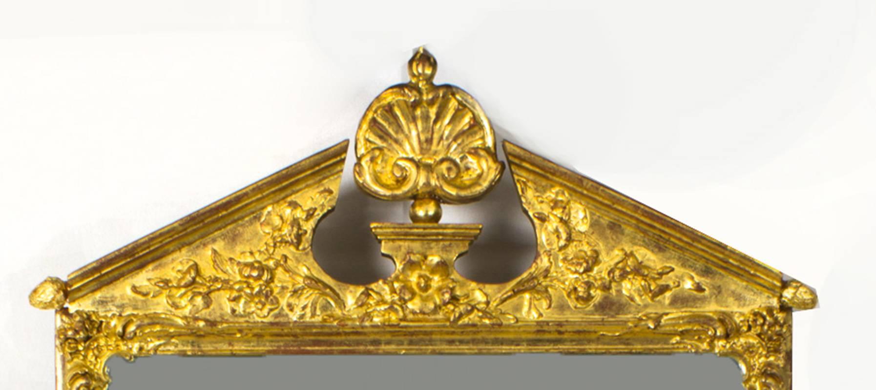 This is a beautiful antique George II style giltwood wall mirror, circa 1870 in date. 

The mirror has a beautiful rectangular shaped frame beautifully carved and gilded with a broken arch cresting centred with a shell and decorated with gilt