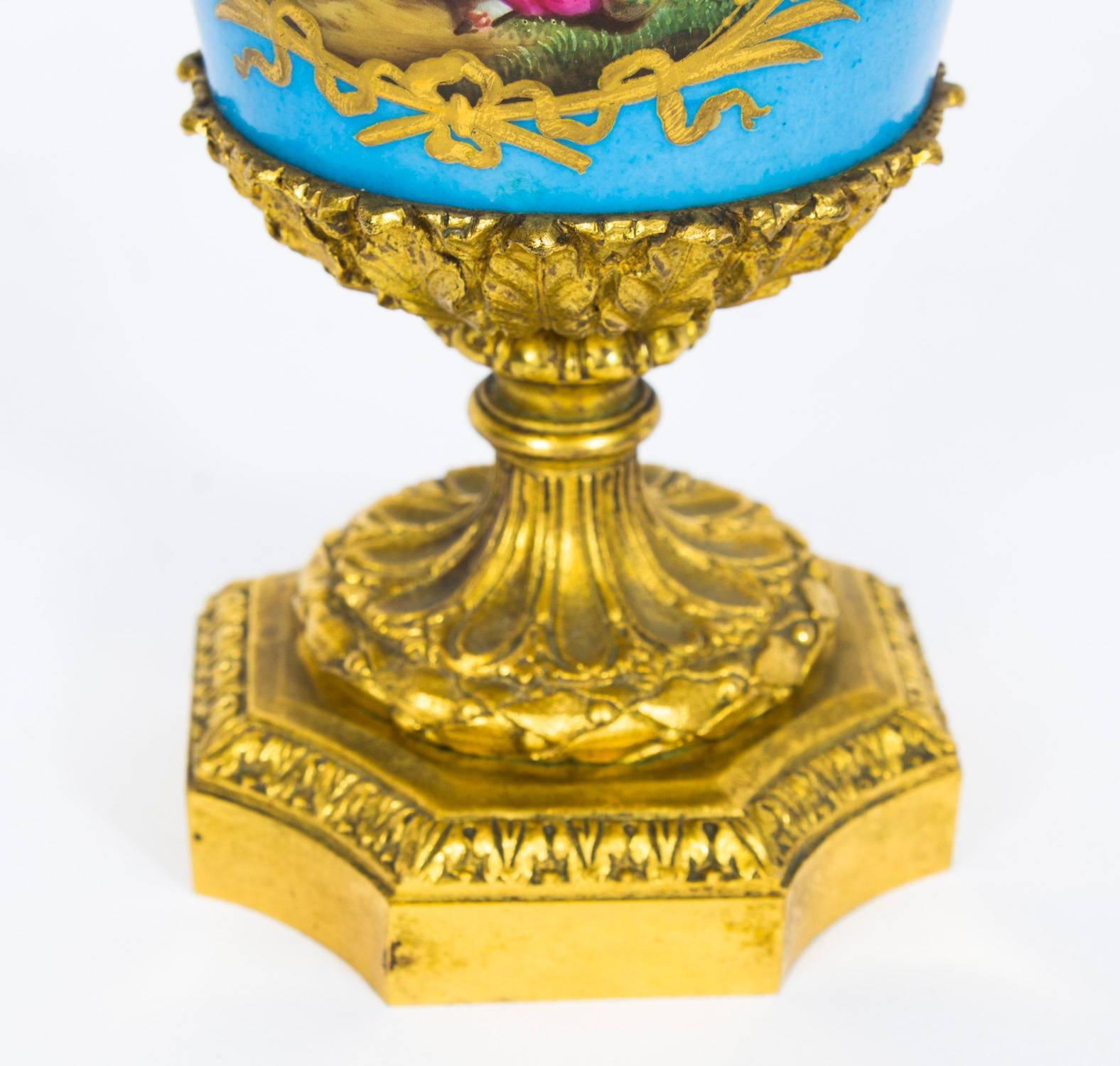 19th Century Pair of French Ormolu-Mounted Sèvres Lidded Urns Vases In Excellent Condition In London, GB
