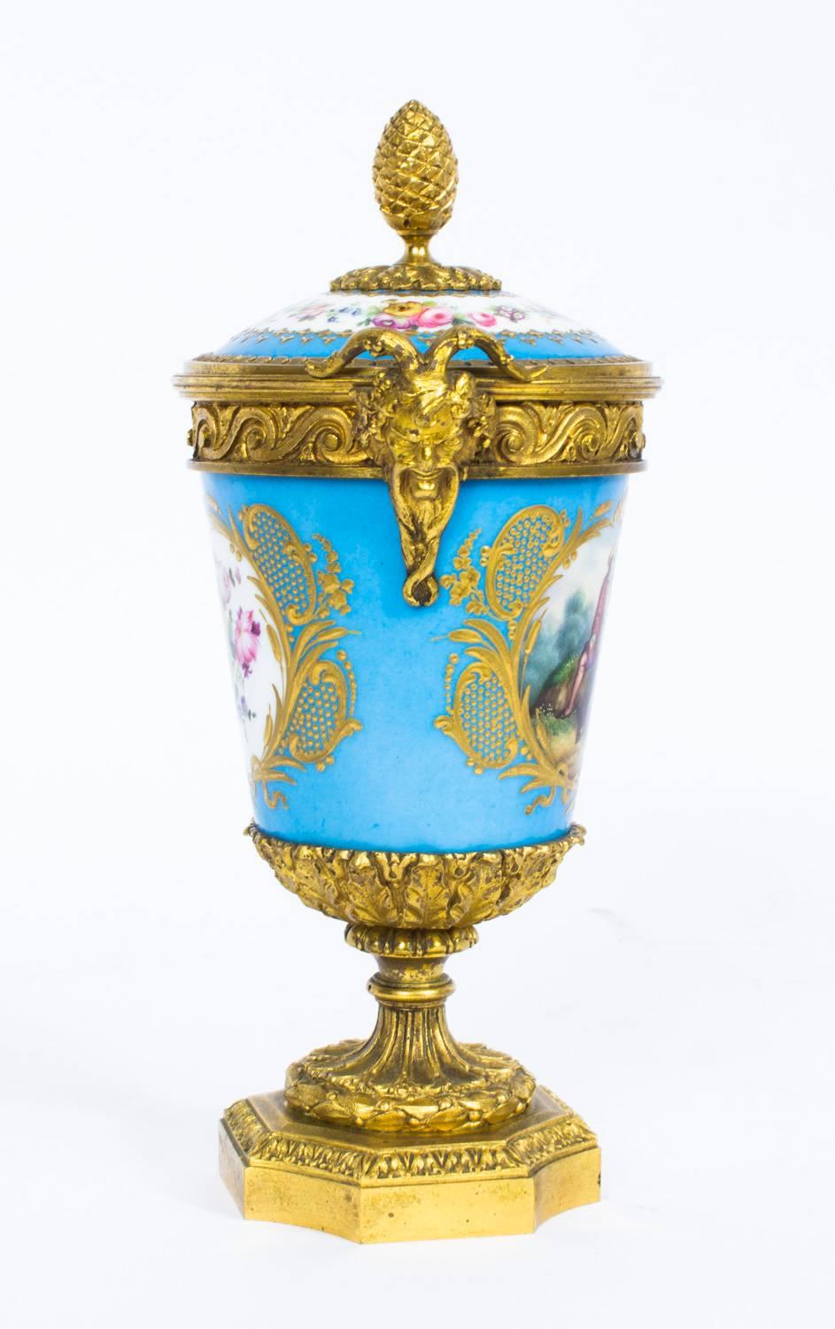 Mid-19th Century 19th Century Pair of French Ormolu-Mounted Sèvres Lidded Urns Vases
