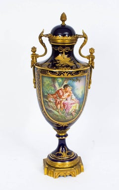 Early 20th Century Pair of Ormolu-Mounted Sevres Style Lidded Urns Vases
