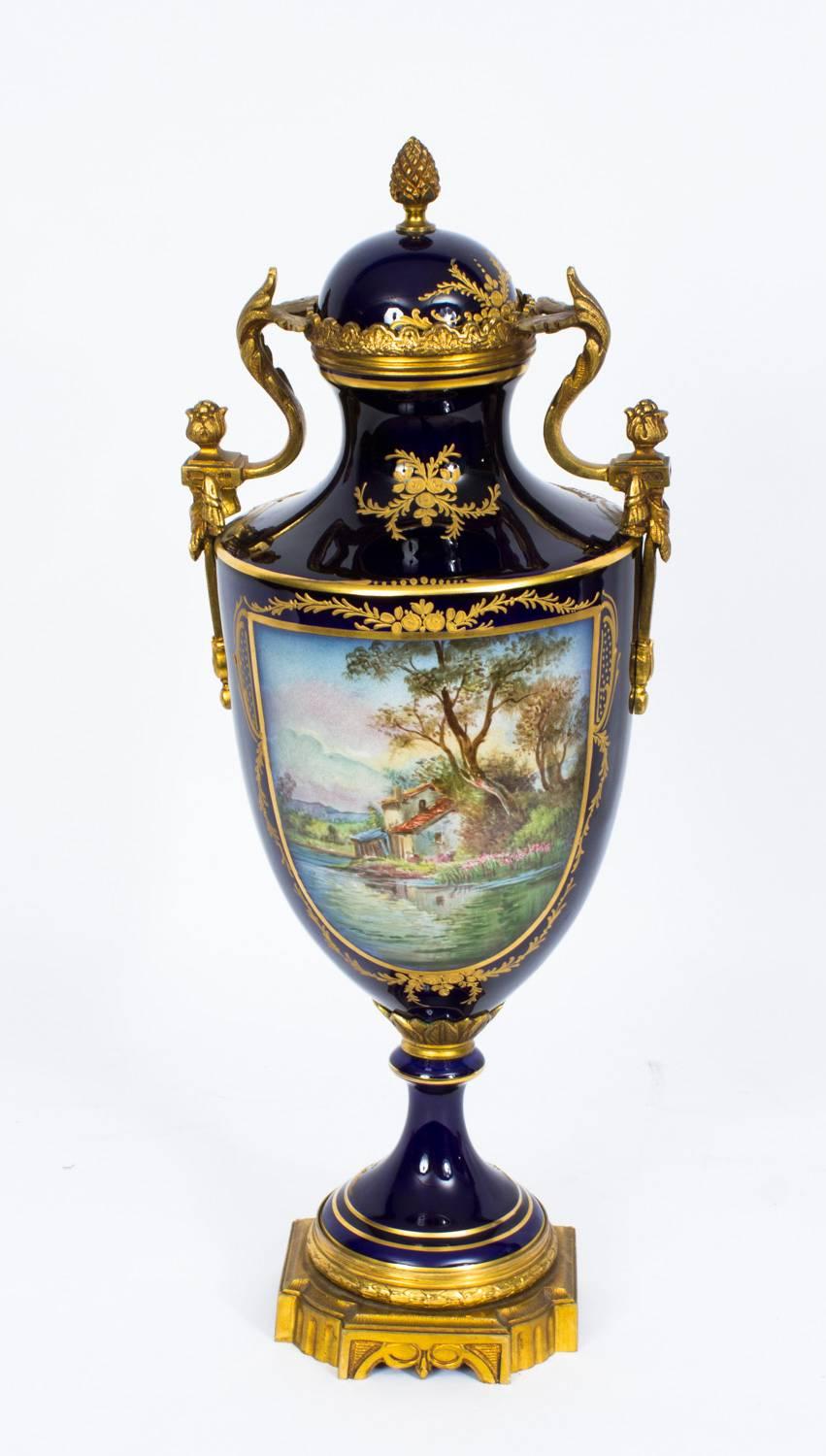 Early 20th Century Pair of Ormolu-Mounted Sevres Style Lidded Urns Vases 1