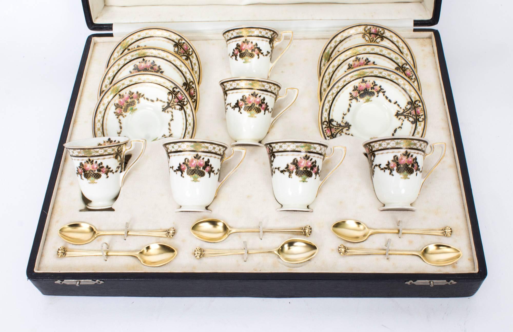This is a lovely antique Royal Worcester porcelain coffee set with date code for 1915.

The timeless Classic Worcester design of this service is decorated with vases of roses and a trellis border finished in blue and gold with the Royal Worcester