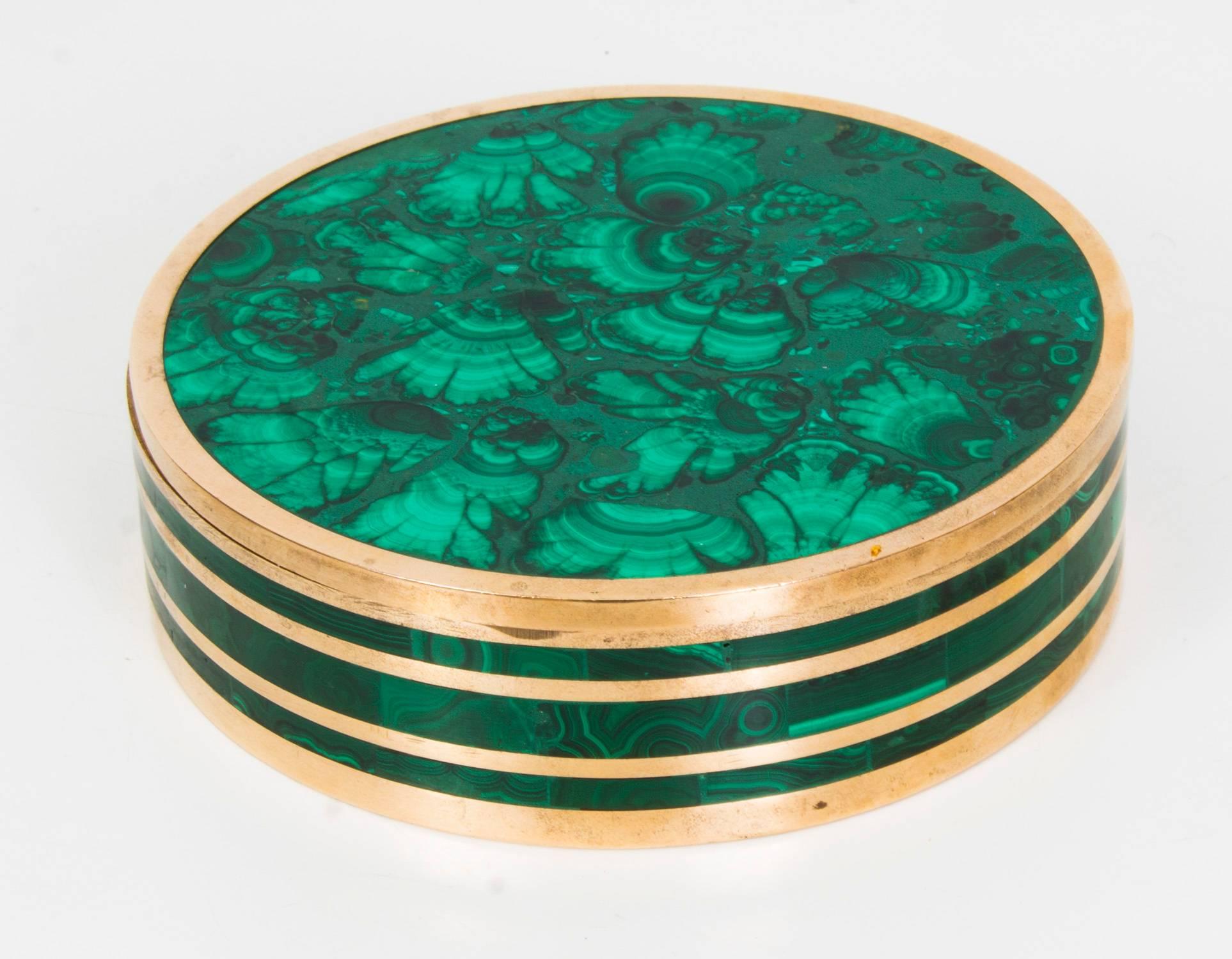 This is a superb quality circular antique malachite mounted brass box and cover dating from circa 1880.

Made from solid malachite and in really superb condition.


Condition:
In excellent condition having been beautifully cleaned in our