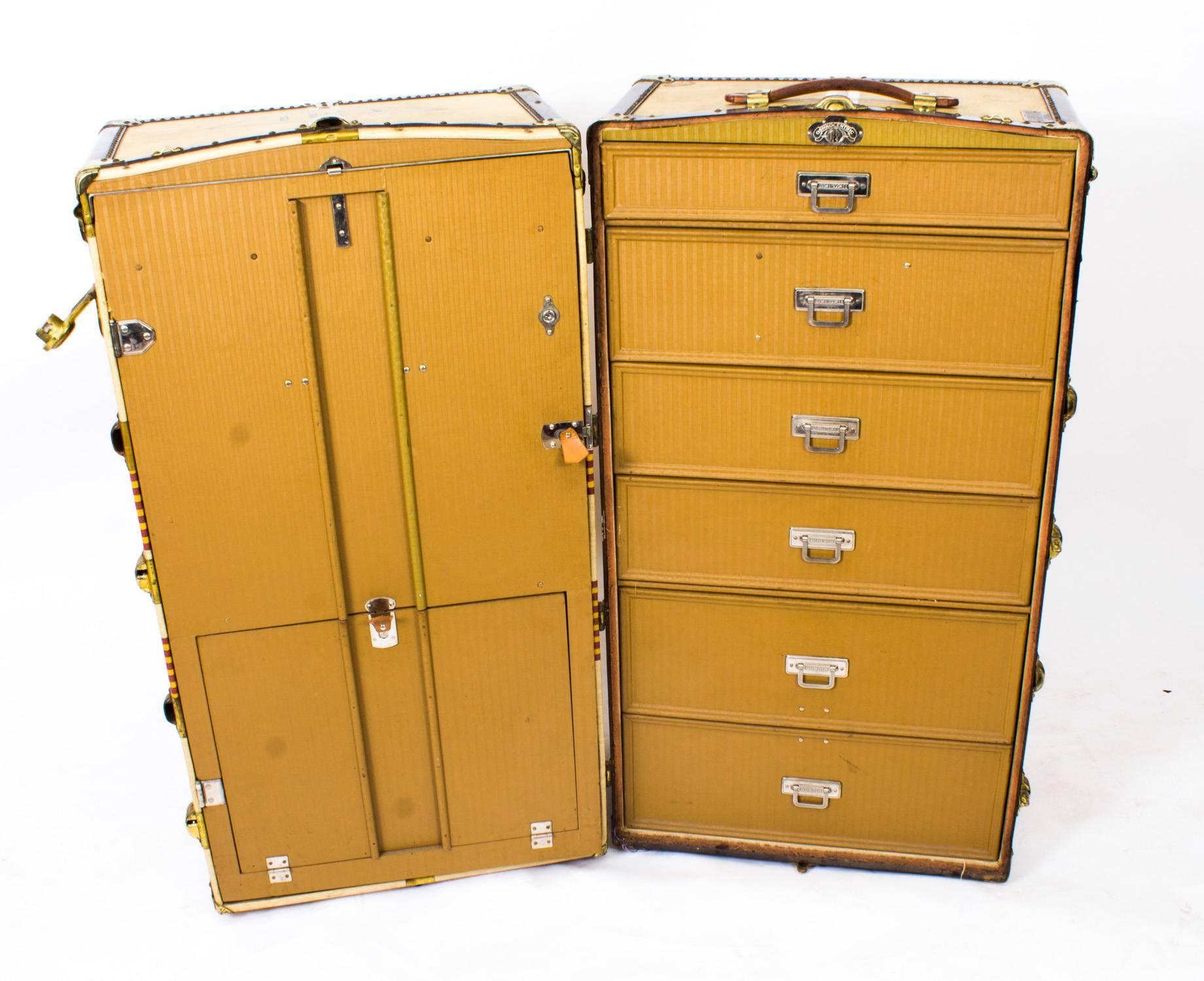 This is an elegant antique Abercrombie & Fitch Oshkosh "Chief" Wardrobe Trunk, circa 1930 in date.

Known for its excellent craftsmanship, superb quality, and amazing distinction, the famous Oshkosh luggage line "Chief"