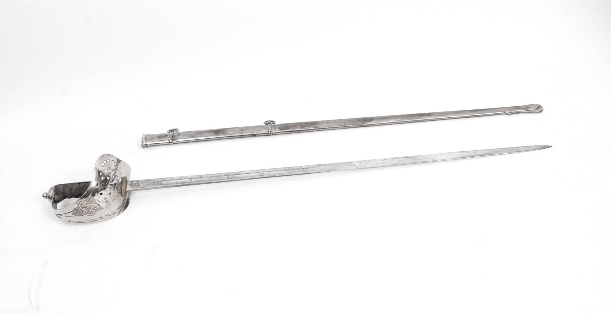A superb George V officers sword with a mounted scabbard retailed by J.R. Gaunt and Son, Late Edward Thurkle, London and Birmingham circa 1897 in date.

The sword features a silver plated pieced foliage basket and shagreen hilt with a single