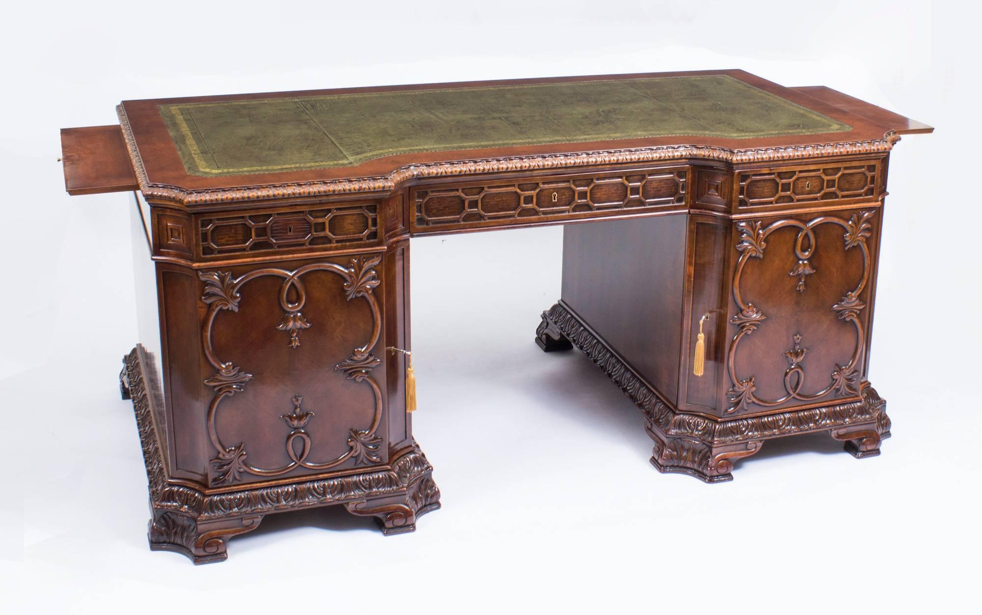 This is a superb antique Chippendale style mahogany pedestal kneehole desk, circa 1880 in date.

It is made from fabulous quality mahogany, the inverted shaped top has an acanthus moulded edge with an olive green gold tooled leather inset with a