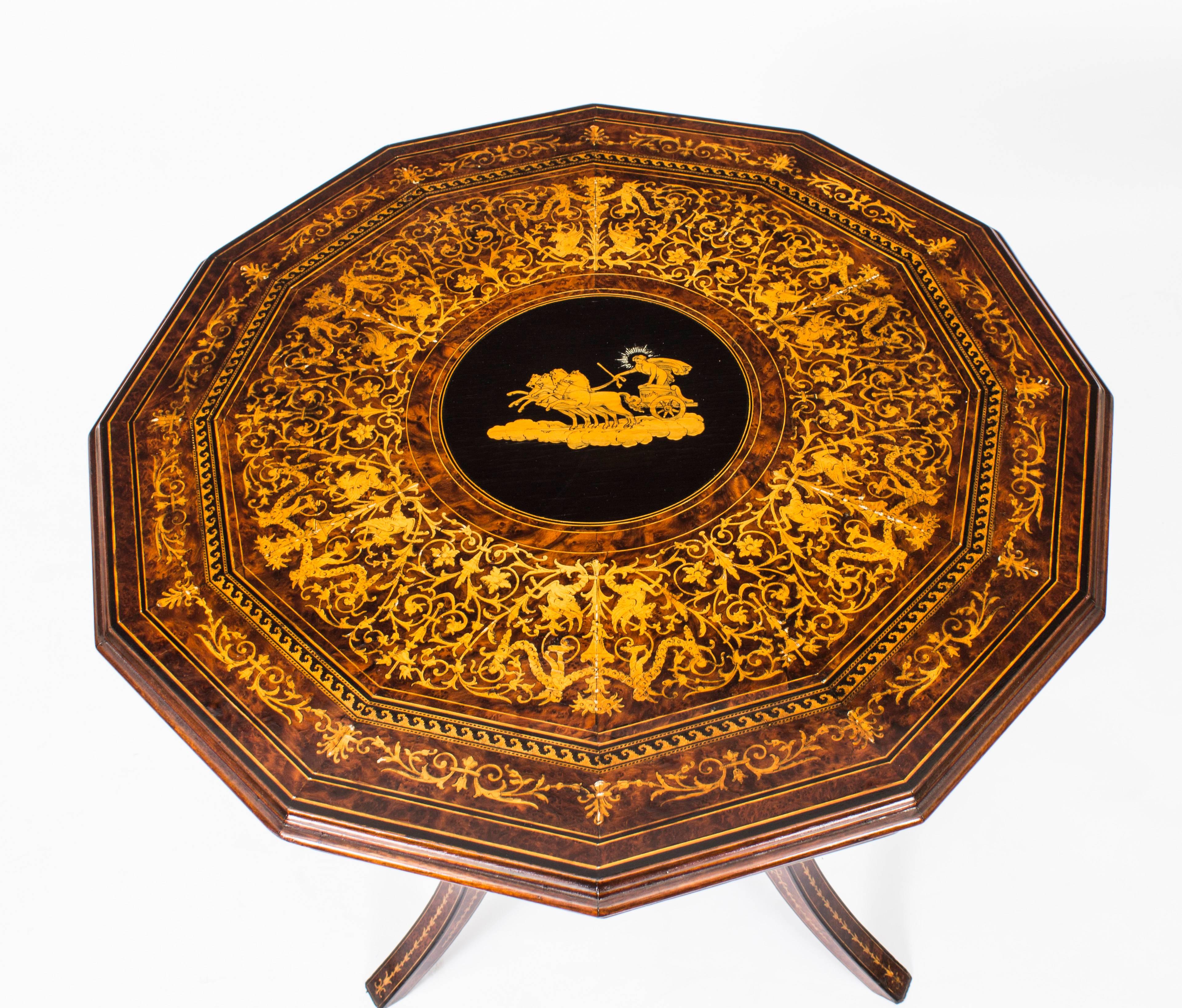 This is a beautiful and rare antique Italian Sorrento marquetry tilt top occasional table of exhibition quality, circa 1830 in date. 

It was handcrafted from burr walnut, exotic specimen woods and olive wood. The 12 sided top richly inlaid and