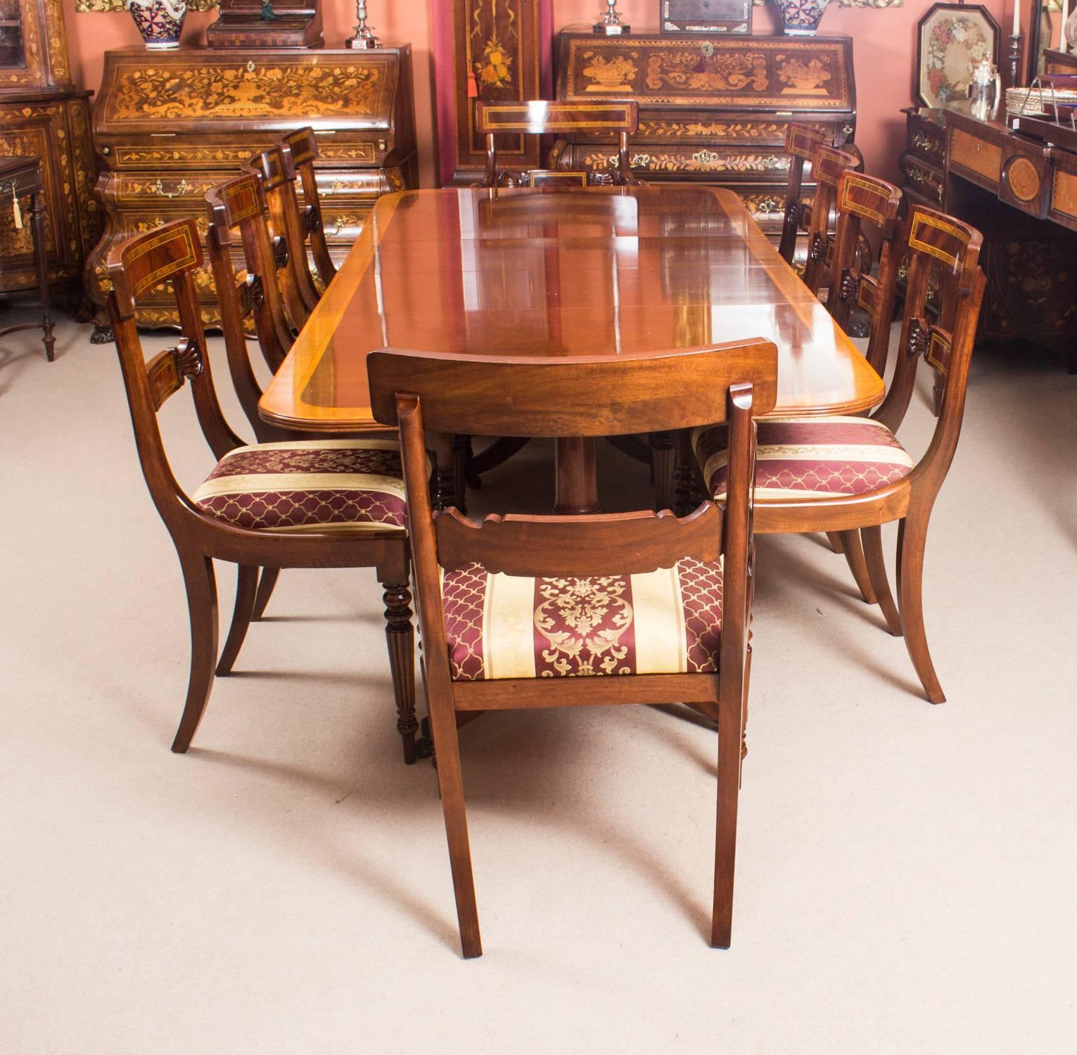 This is fabulous vintage dining set comprising a Regency style dining table by William Tillman, bought from Harrods, Knightsbridge, London in 1982 and ten matching dining chairs.

The beautiful Regency style dining table is made of solid flame