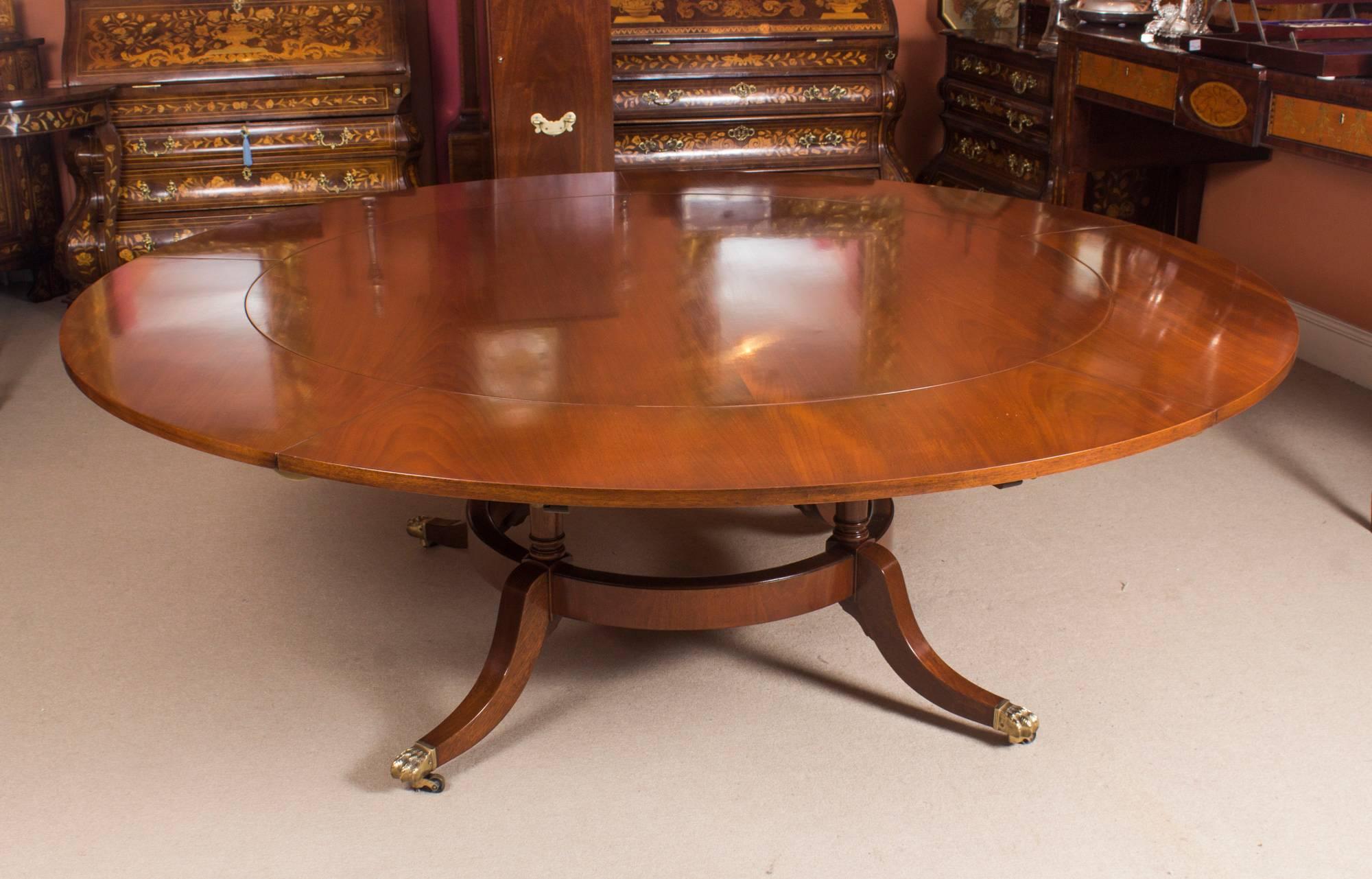 Regency Revival Vintage Mahogany Jupe Dining Table, Leaf Cabinet and Ten Chairs