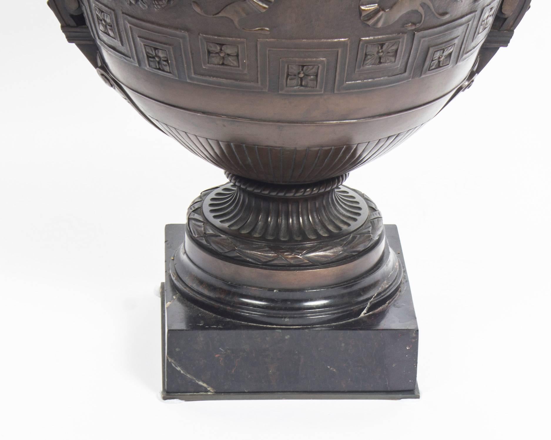 A superb antique Grand Tour patinated bronze Barbedienne style urn, circa 1870 in date.
 
This stunning Renaissance style patinated bronze urn is cast in the manner of Barbedienne. The body is cast with a ribbon and floral garland frieze centred by