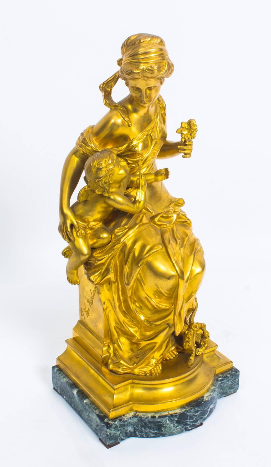 A beautiful gilt bronze sculpture of Cupid and Venus by Antoine Joseph Van Rasbourg (Belgium, 1831-1902) Circa 1860 in date.

The sculpture portrays the classically dressed goddess Venus holding the winged Cupid while he points an arrow  at her