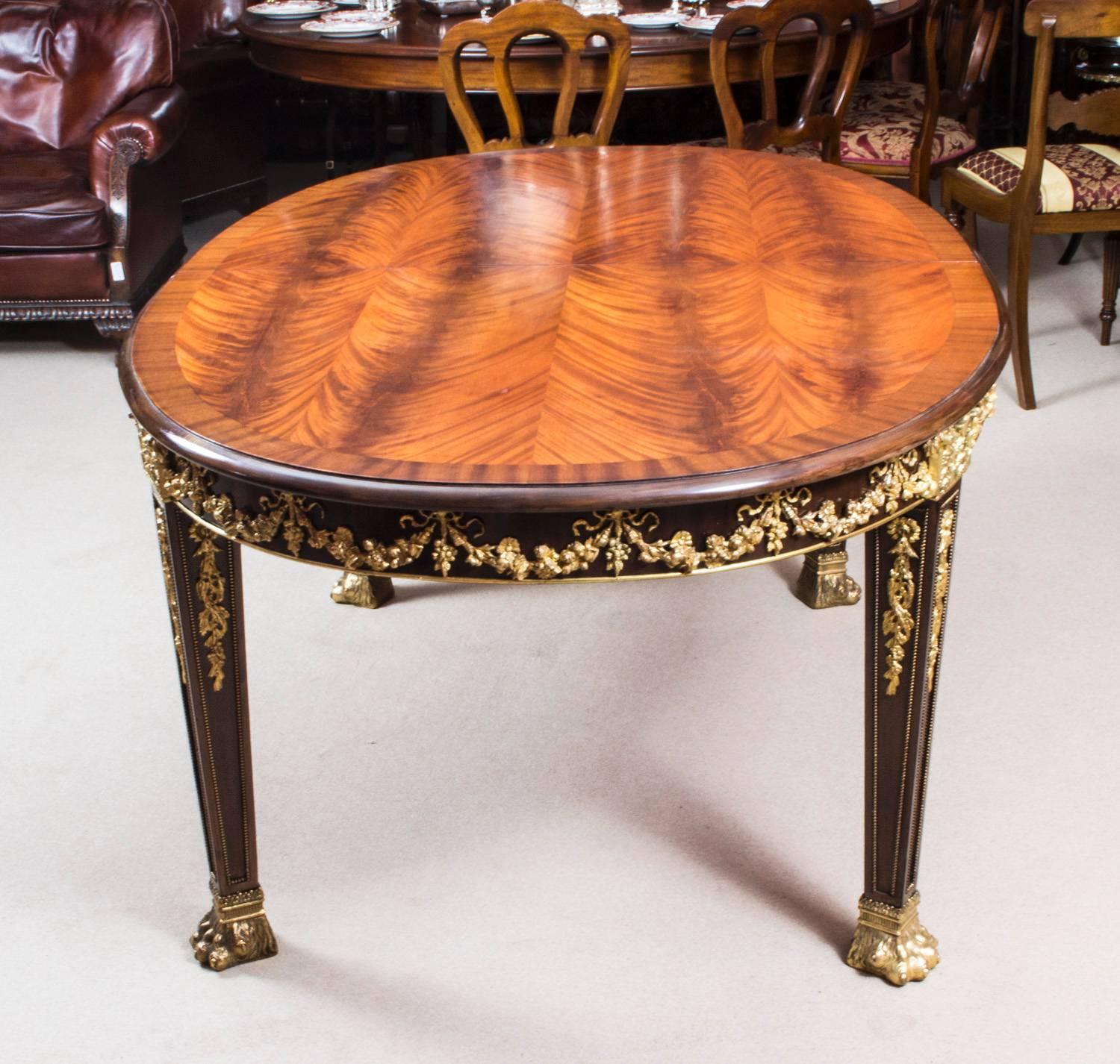 English Antique Flame Mahogany Ormolu Dining Table and Ten Chairs