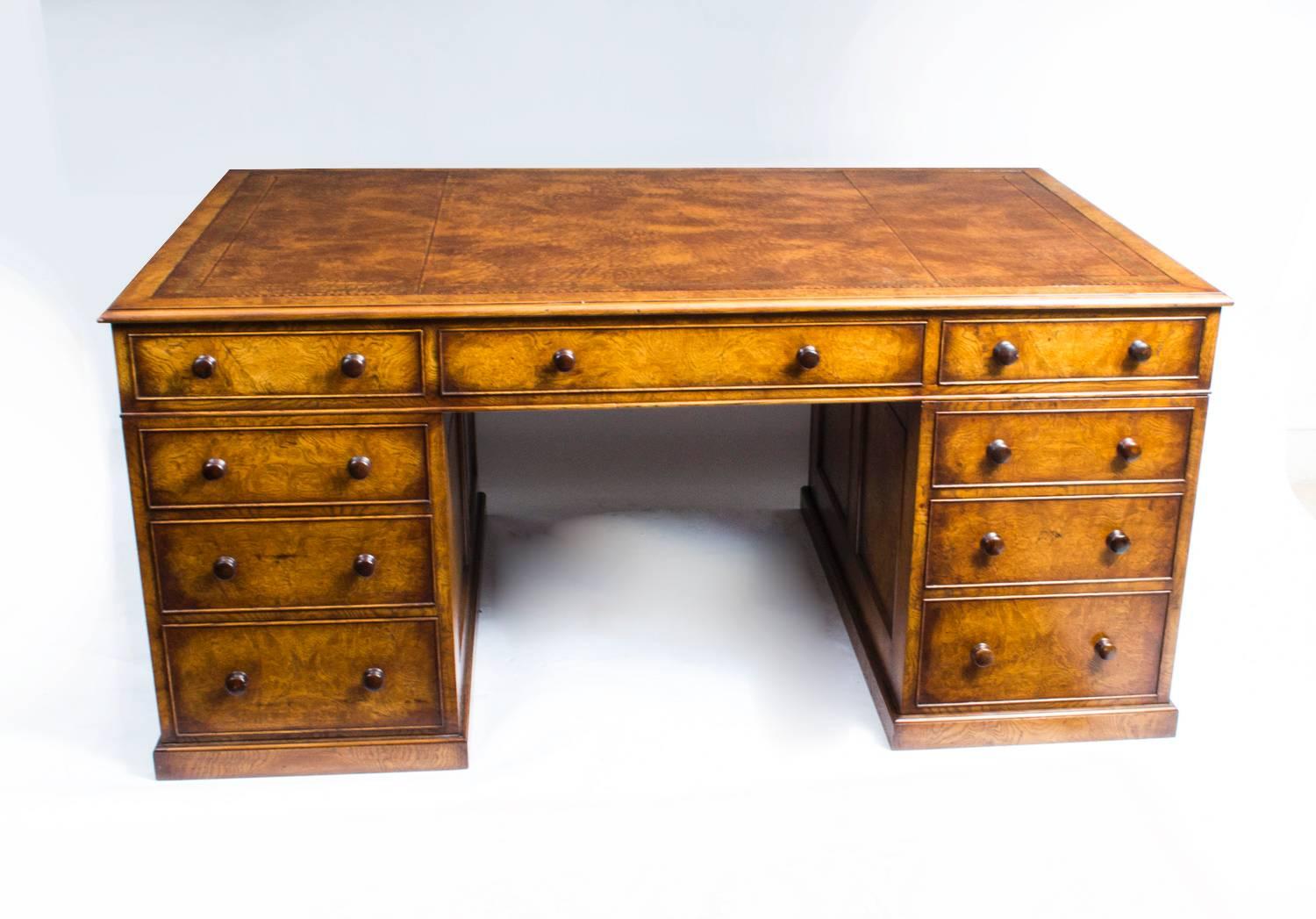 This is a beautiful antique Edwardian pollard oak and solid oak pedestal partners desk, circa 1860 in date.

The desk is made from solid oak with wonderful burr Pollard Oak veneers. It is fitted to one side with one long and two short frieze
