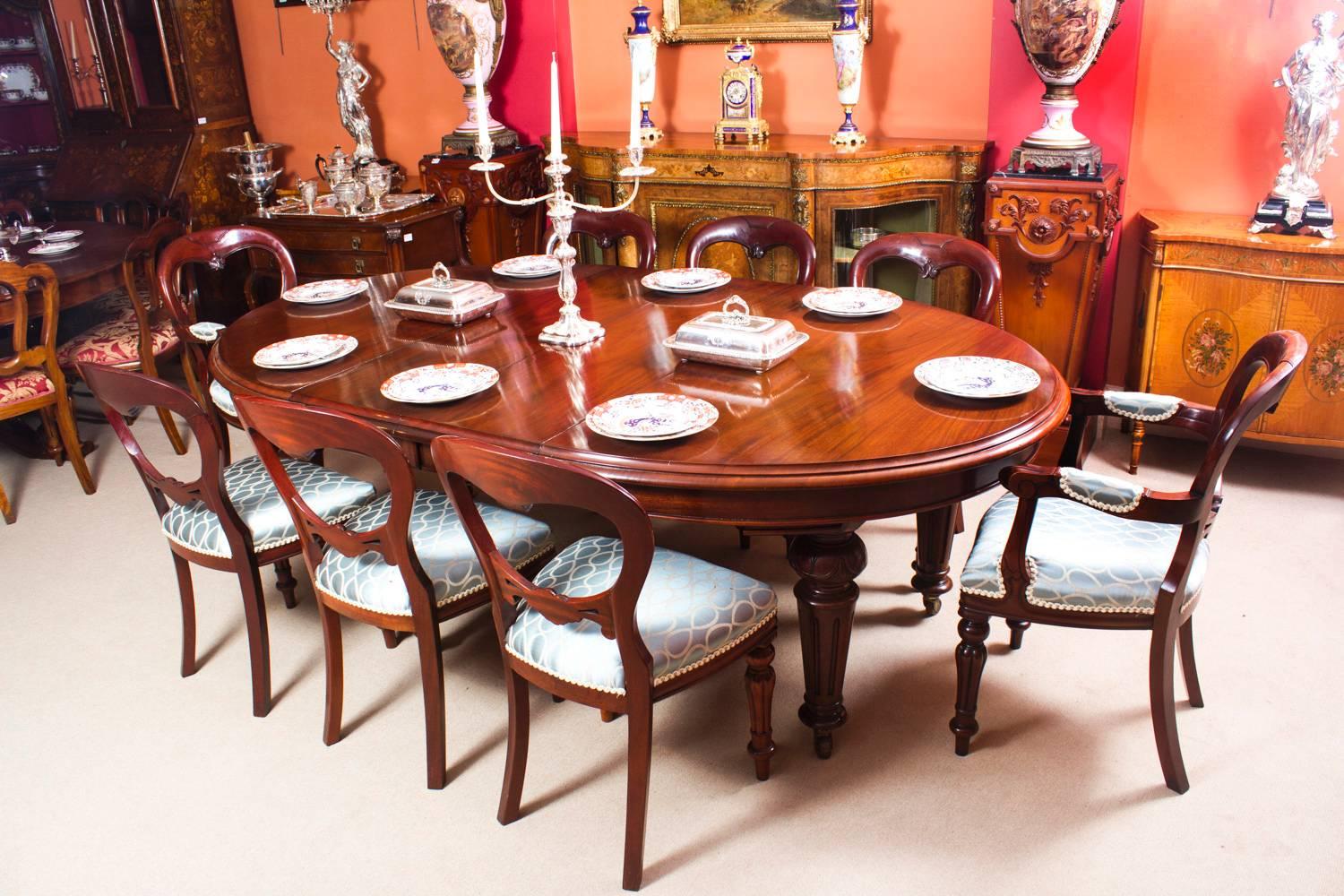 This is a fabulous dining set comprising an antique Victorian mahogany oval extending dining table, circa 1860 in date with a set of eight Victorian style balloon back dining chairs.

The table has two original leaves and has been handcrafted from