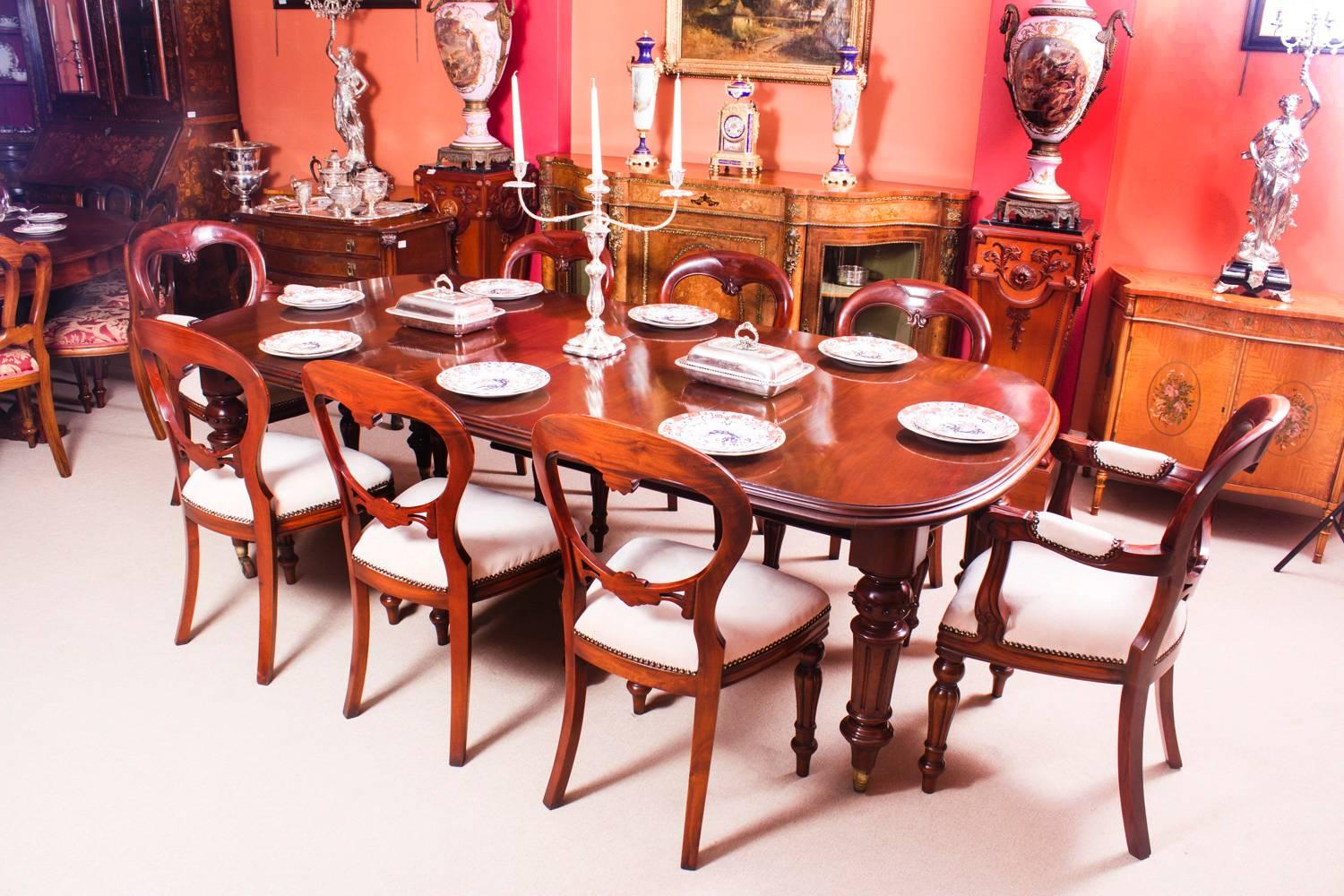 This is a beautiful antique dining set comprising an antique Victorian D-end dining table, circa 1860 in date and a set of eight Victorian style balloon back dining chairs.

This amazing table has two original leaves, can sit eight people in