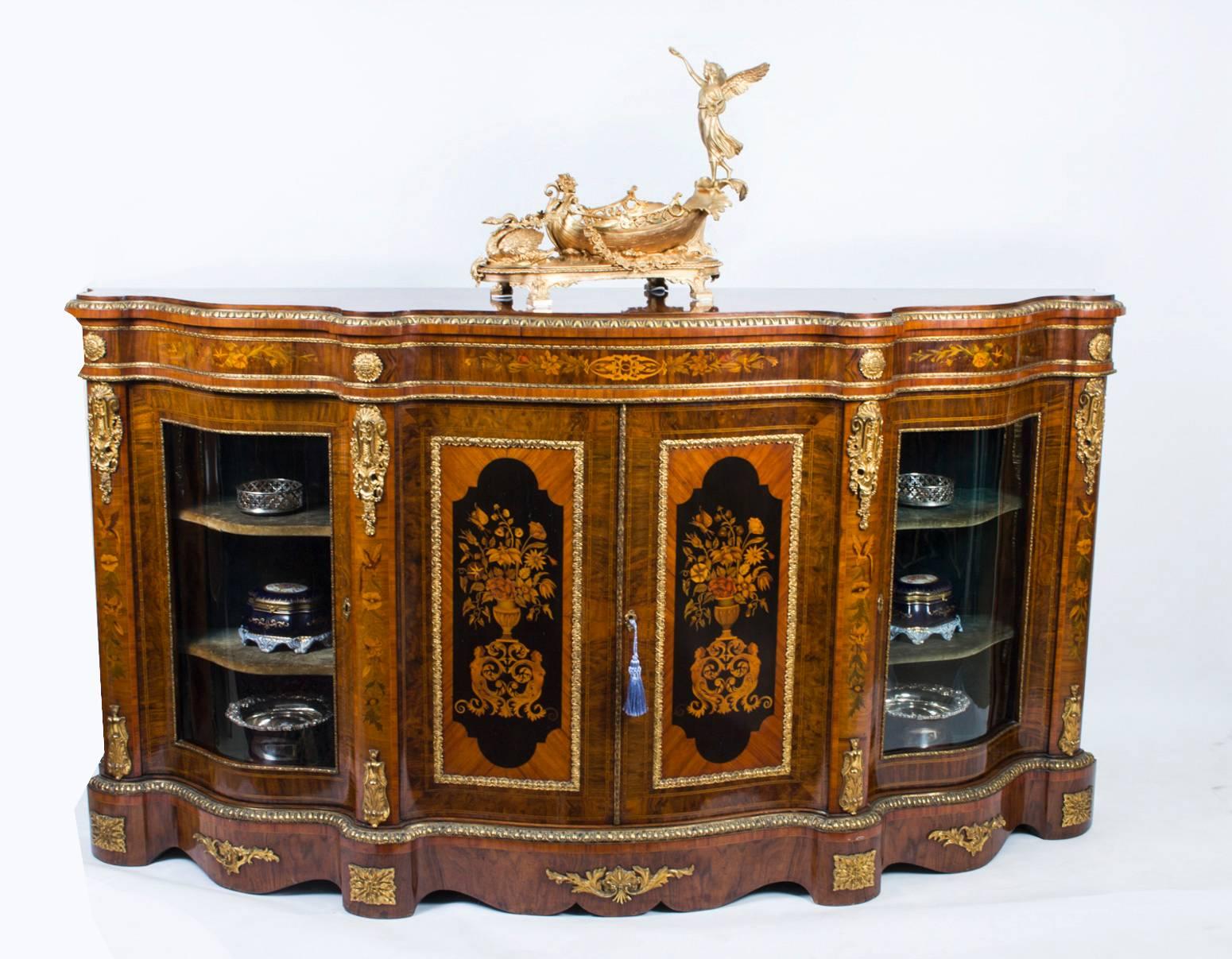 This is a superb antique Victorian ormolu mounted burr walnut and kingwood floral marquetry inlaid credenza, circa 1860 in date. Oozing sophistication and charm, this credenza is the absolute epitome of Victorian High Society.

The entire piece