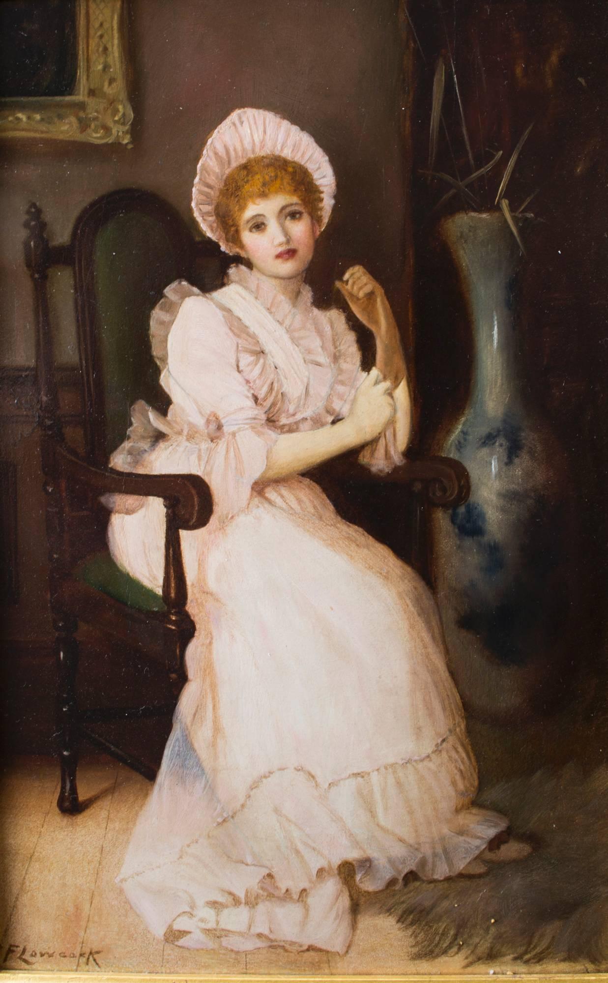 This is a superb oil on panel painting titled "The New Gown" and signed bottom left by the artist., Charles Frederick Lowcock circa 1880 in date.

Beautifully painted this sensitive and penetrating character study of a young woman shows