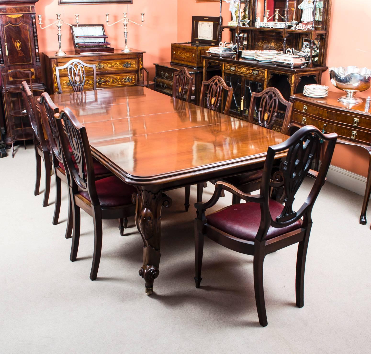 This is a beautiful antique dining set comprising an antique Victorian mahogany dining table, circa 1860 in date, and a set of eight antique English Hepplewhite dining chairs.

This amazing table has two original leaves and can sit ten people in