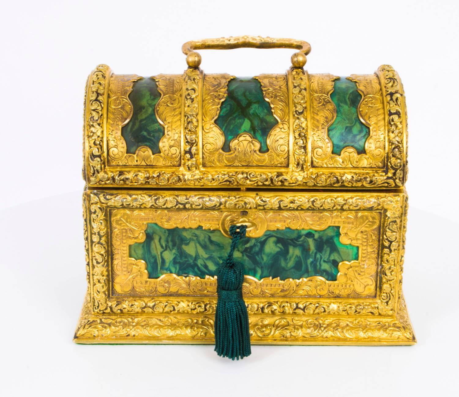 This lovely casket from Asprey London is beautifully decorated with faux malachite inlay and gilded ormolu, circa 1870 in date. The interior is lined with the original burgundy velvet and is ready to store your precious items.

It is a lovely