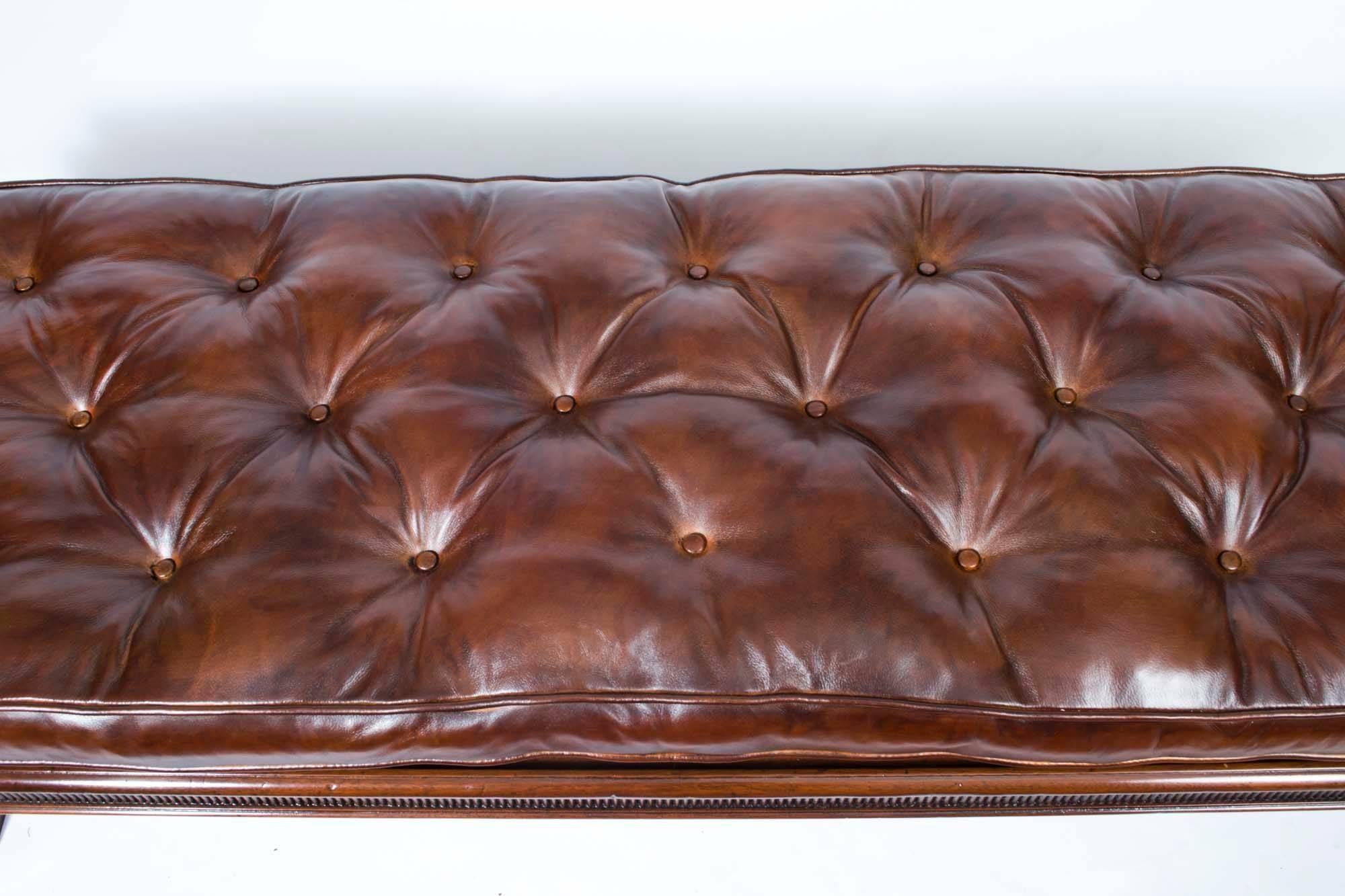 This is a stunning antique William IV mahogany and leather banquette or stool, circa 1835 in date.
 
It has fantastic button backed leather upholstery in a fabulous color, we call it browny burnt orange.

This banquette is truly lovely and would