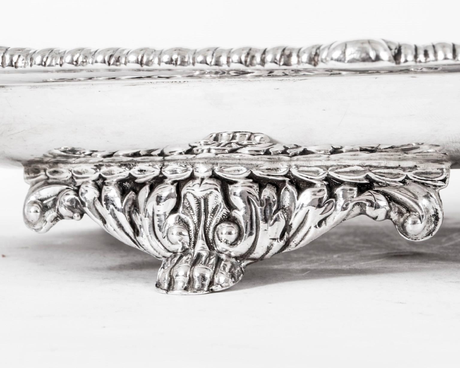 This is a wonderful English antique sterling silver tray, or serving dish, by the world famous silversmith Paul Storr.

It has really clear hallmarks for London 1826 and the makers mark of Paul Storr.

It is typical of his work with the