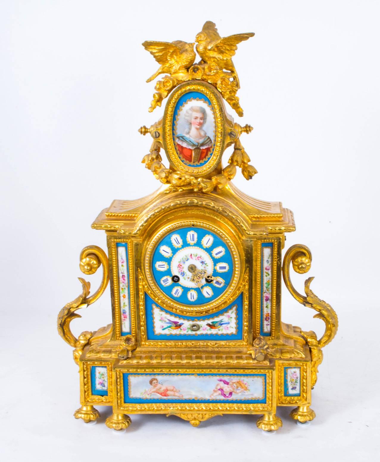 This is a beautiful antique French ormolu and Sèvres Porcelain porcelain mantel clock, striking the hours and half hours and circa 1860 in date.

It is set within a beautiful ormolu Baroque case that is surmounted by garlands and doves, and set