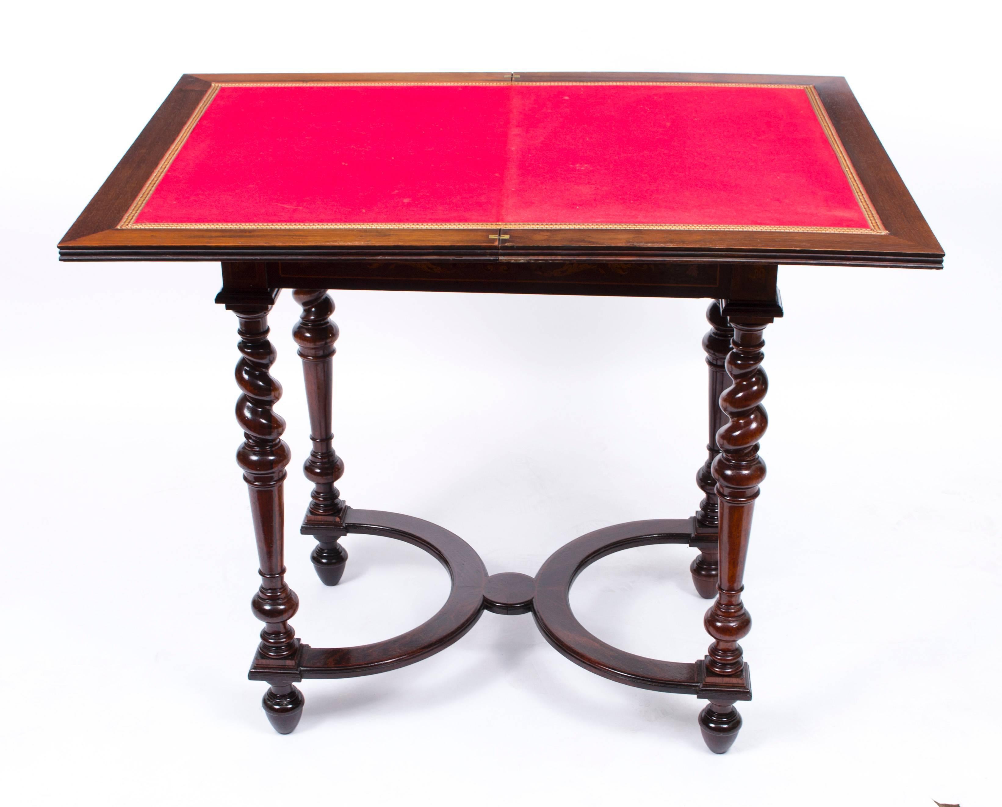 This is an important antique French marquetry card table, circa 1890 in date.

The craftsmanship and finish are second to none and the table is made from rosewood, mahogany and satinwood and features exquisite floral marquetry decoration. The card