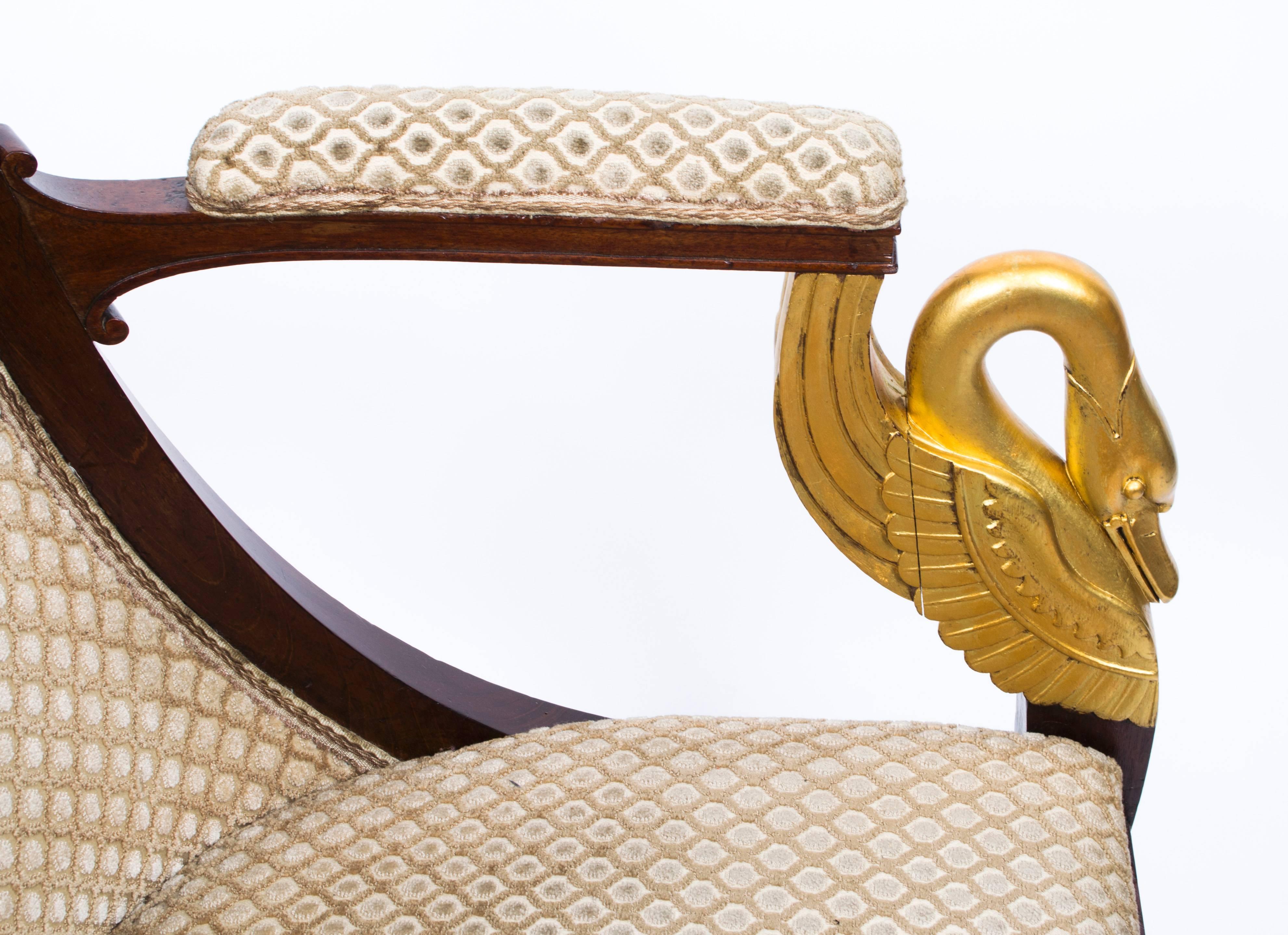 French Antique Pair of Empire Gilded Swan Neck Mahogany Armchairs, circa 1820