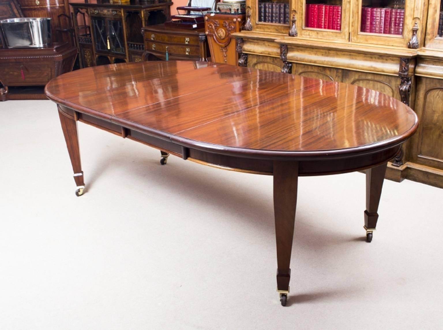 This is a rare opportunity to own an antique Edwardian oval extending dining table, made of flame mahogany and the matching set of eight antique Edwardian shield back dining chairs.

The table has two leaves which can be added or removed as