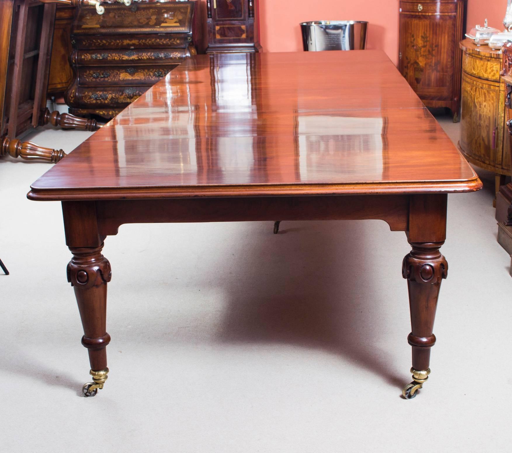 This is a rare opportunity to own an antique mid Victorian, flame mahogany dining or conference table, circa 1850 in date, which can seat 14 people in comfort.

It has four original leaves and the original leaf holder and these leaves can be added