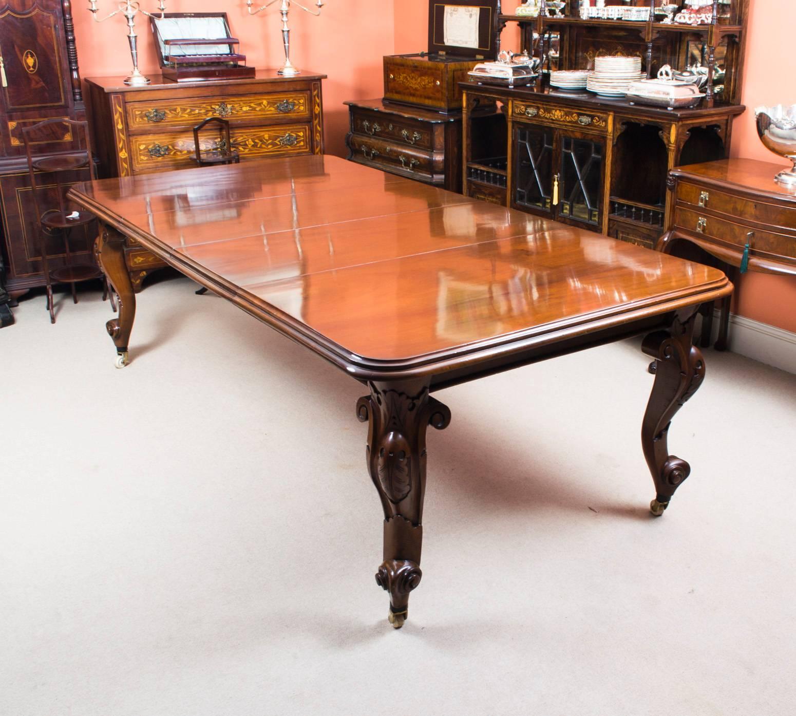 This is a beautiful antique dining set comprising an antique Victorian mahogany dining table, circa 1860 in date and a set of ten English tulip back dining chairs.

This amazing table has two original leaves and can sit ten people in comfort. This