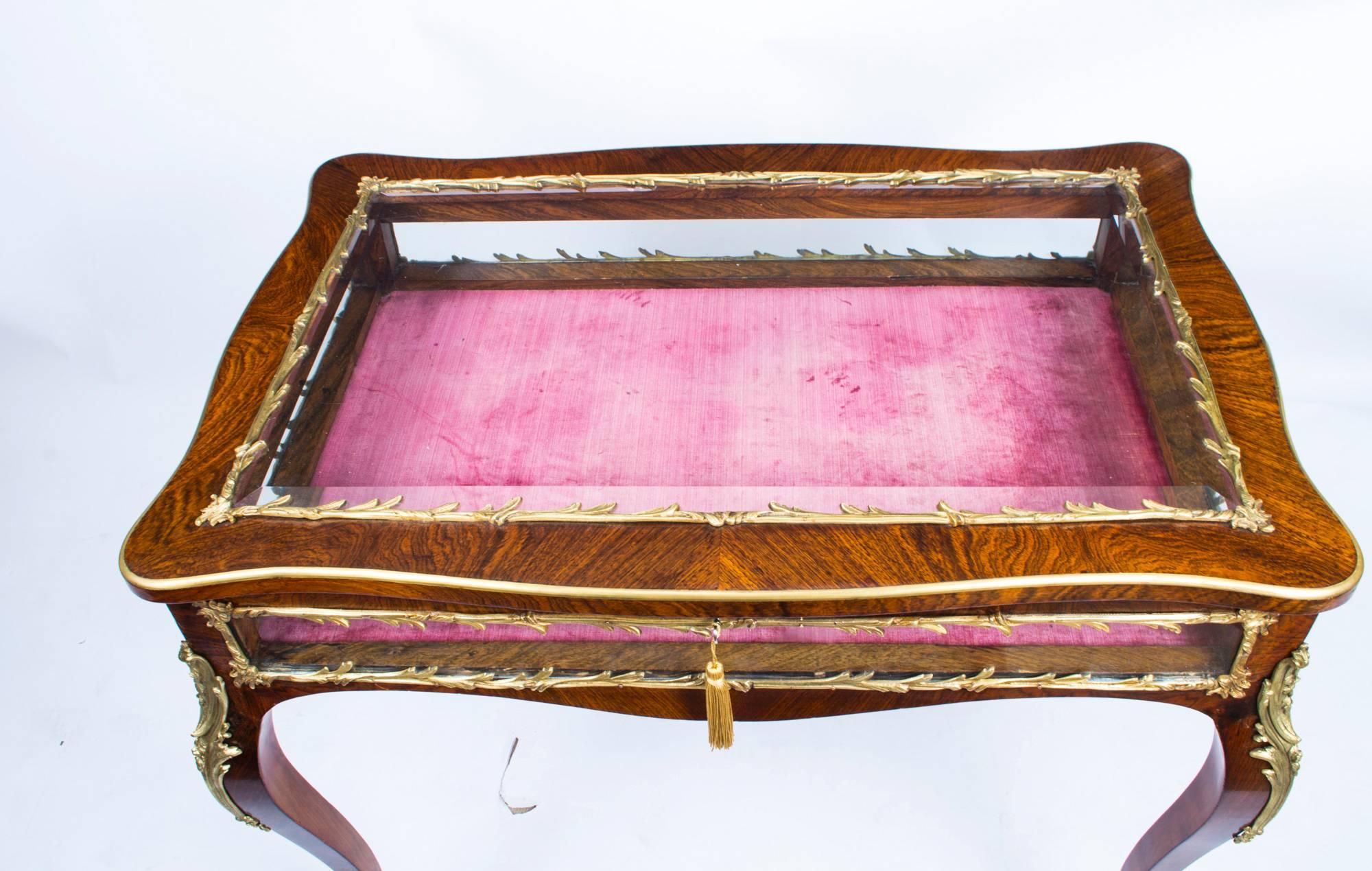 glass top display table antique