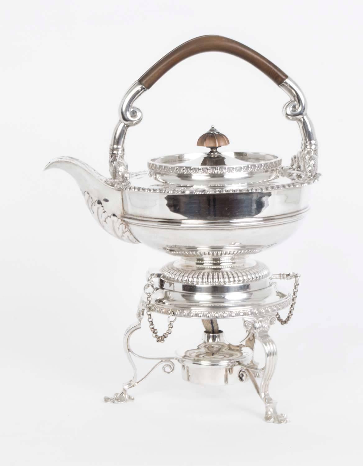 This is a wonderful antique English five-piece sterling silver tea and coffee set with kettle on stand, by the renowned Sheffield silversmith James Dixon & Sons and in the fabulous style of Paul Storr.

The set consists of:
The coffee
