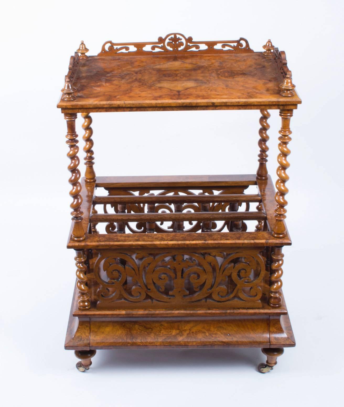 This is a gorgeous antique Victorian burr walnut Canterbury, circa 1850 in date.

The grain of the burr walnut is truly beautiful and the solid walnut fret carved sides and turned dividers are a masterpiece of the Victorian cabinet maker’s art.

It