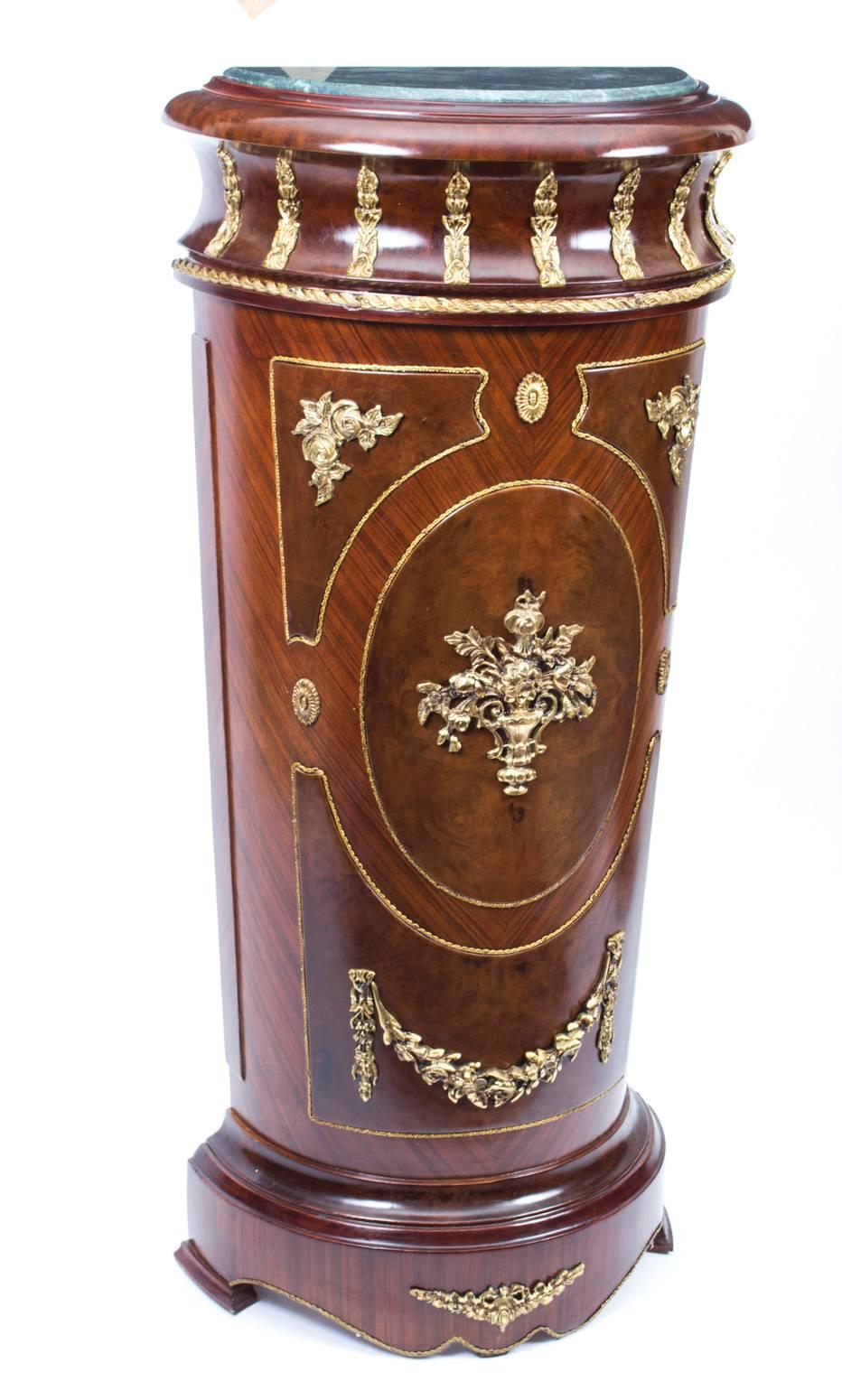 This is a gorgeous vintage pair of French burr walnut and rosewood half moon pedestals with inset 